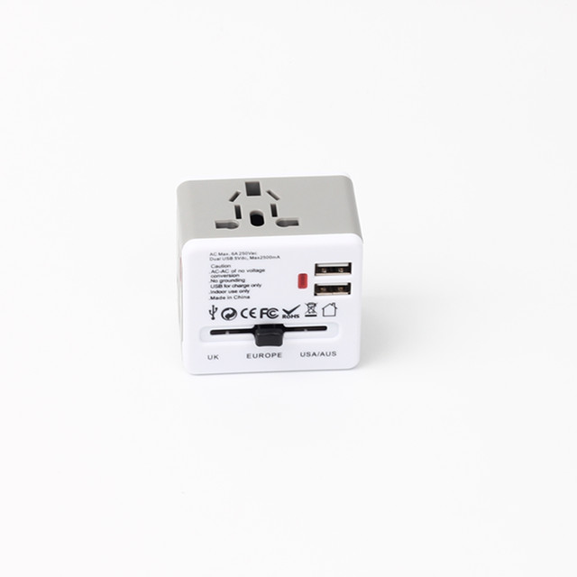 Universal travel adapter with 2 USB 1